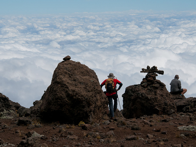 21681800 – on the trail to kilimanjaro looking out over the clouds